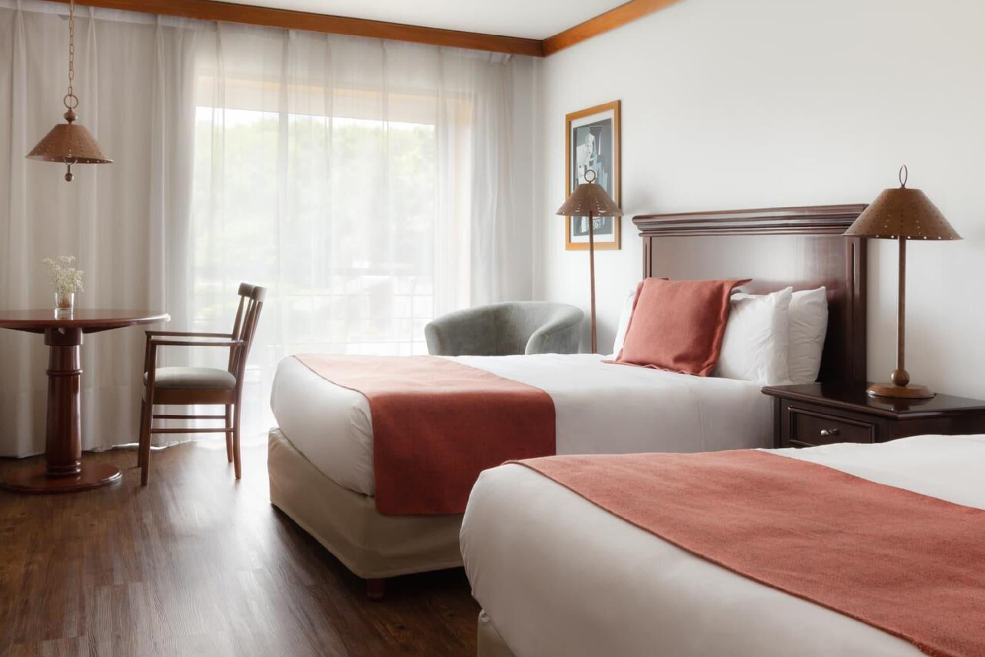 Radisson Hotel Colonia Del Sacramento Exterior photo A typical room at the Hilton Garden Inn