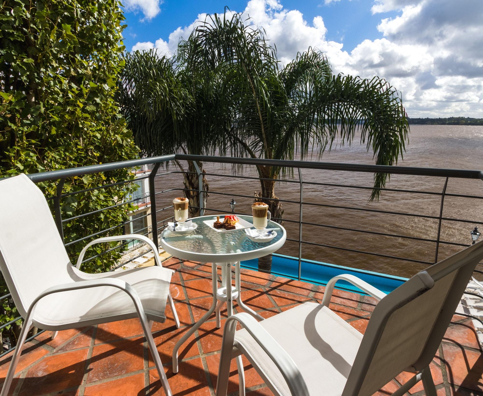 Radisson Hotel Colonia Del Sacramento Exterior photo A balcony