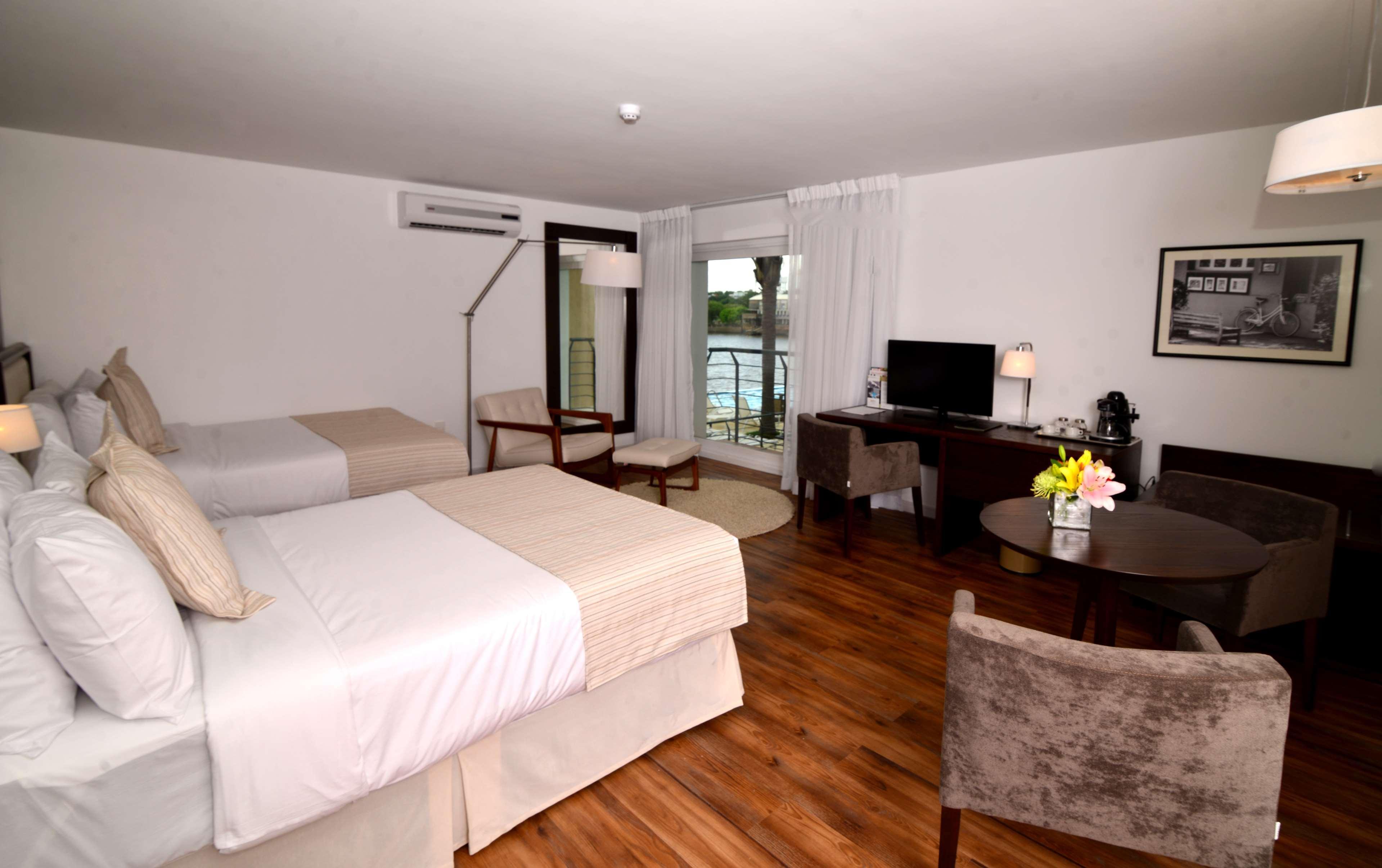 Radisson Hotel Colonia Del Sacramento Exterior photo A room at the hotel