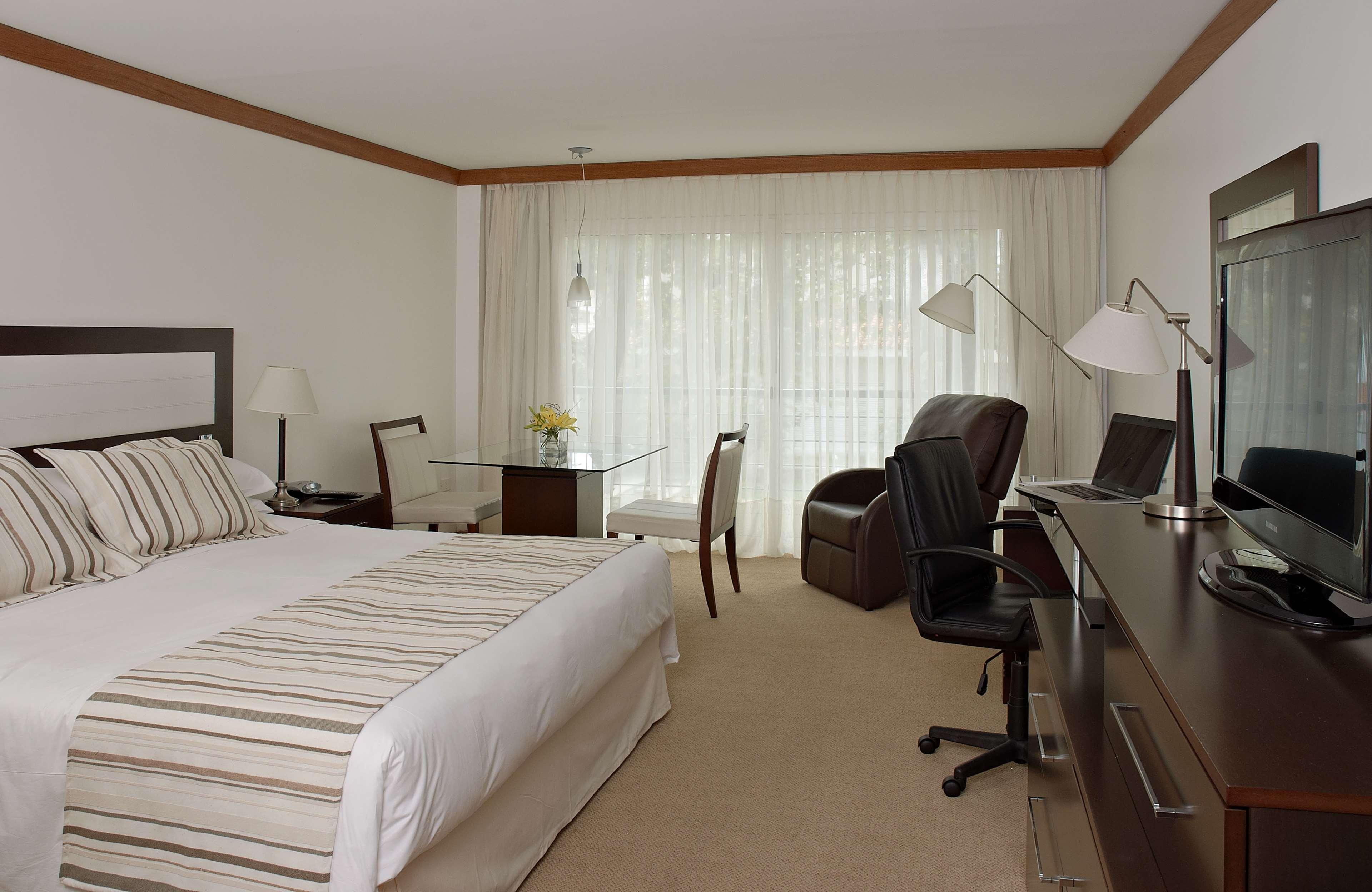 Radisson Hotel Colonia Del Sacramento Exterior photo A room at the Hotel