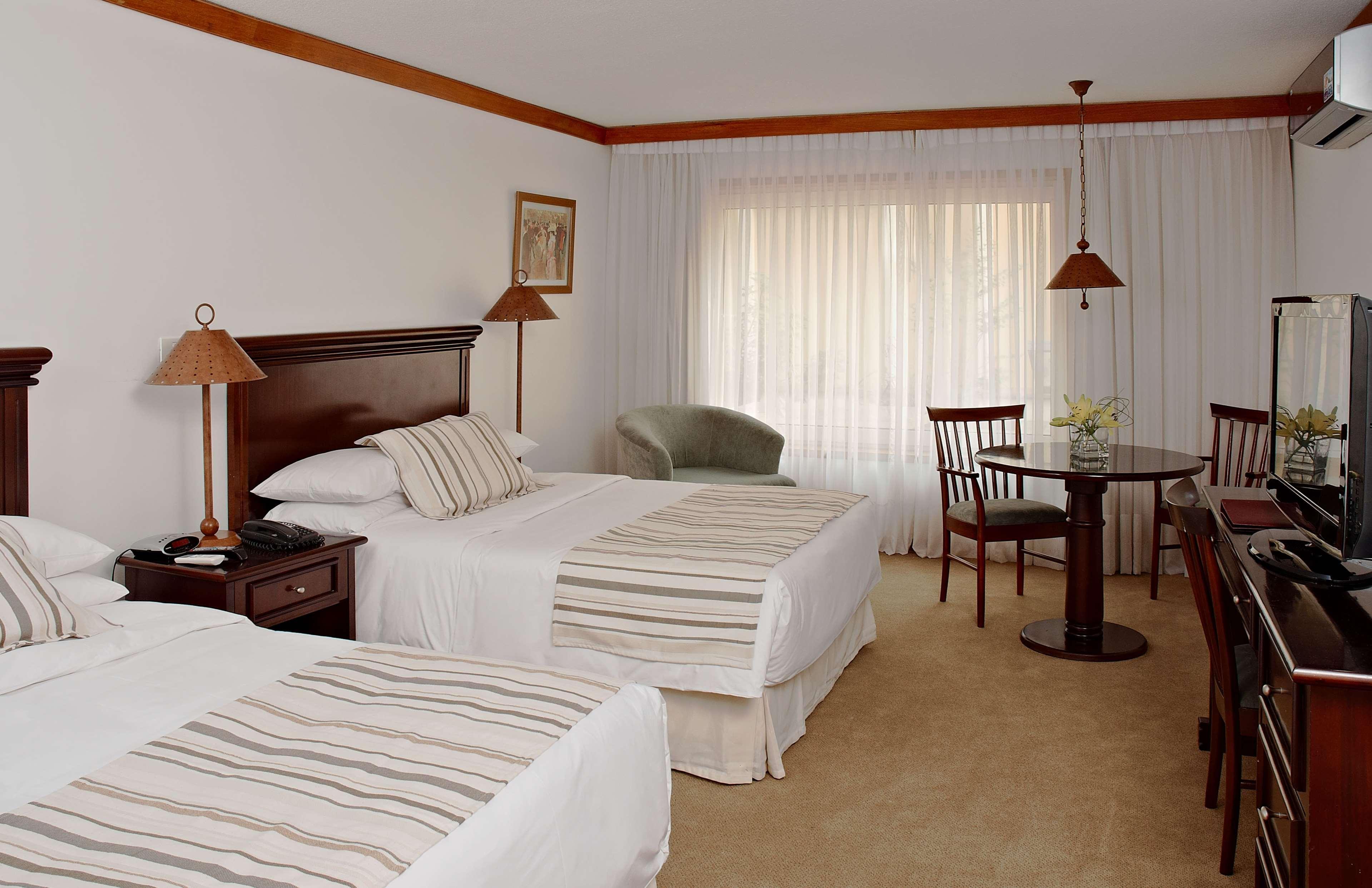 Radisson Hotel Colonia Del Sacramento Exterior photo A room at the hotel