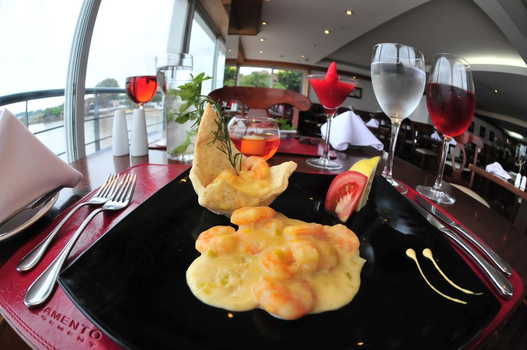 Radisson Hotel Colonia Del Sacramento Exterior photo A prawn and mango salad