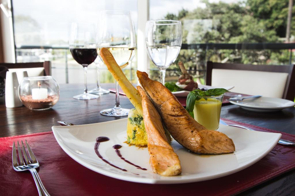 Radisson Hotel Colonia Del Sacramento Exterior photo A salmon dish