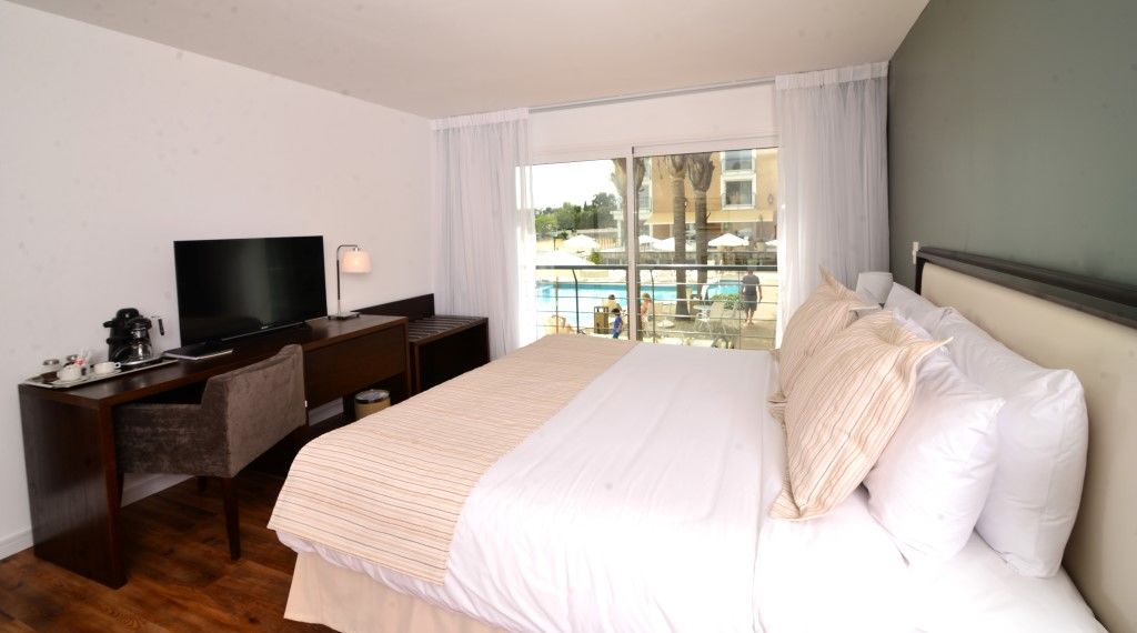 Radisson Hotel Colonia Del Sacramento Exterior photo A bedroom at the hotel